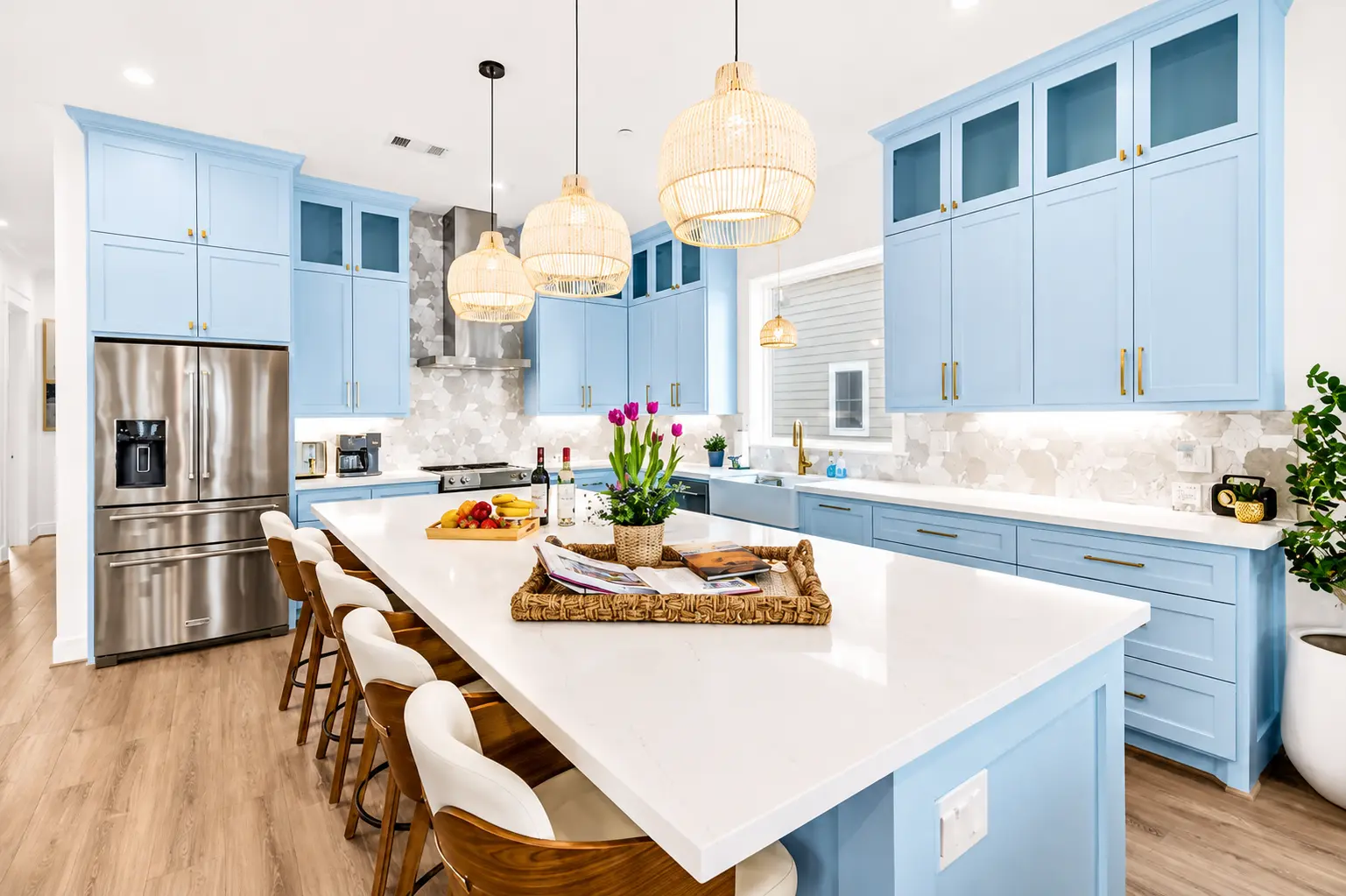 Chef's kitchen with island seating at Grand Beach Retreat